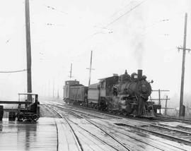 Pacific Coast Railroad freight train at Maple Valley, Washington, circa 1943.