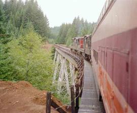 Port of Tillamook Bay Excursion Train on Trestle at Tillamook, Oregon in October, 1988.