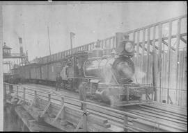 Northern Pacific steam locomotive 97 at Kalama, Washington, circa 1900.