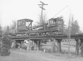 Seattle Municipal Railway Number 414 at the Woodland Park trestle, Seattle, Washington, 1939.