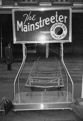 Northern Pacific Mainstreeter gate sign at Seattle, Washington, in 1955.