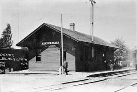 Chicago, Milwaukee, St. Paul & Pacific Railroad Company depot at Black Earth, Wisconsin, in 1...