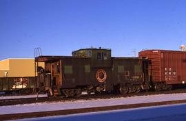 Burlington Northern steel caboose 10050 at Longmont, Colorado, in 1989.
